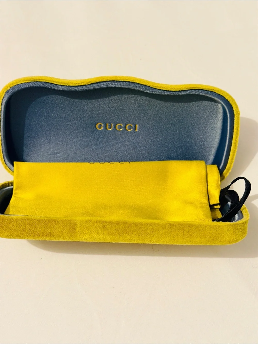 Gucci Rimless Men's Glasses in Black and Gold Accents
